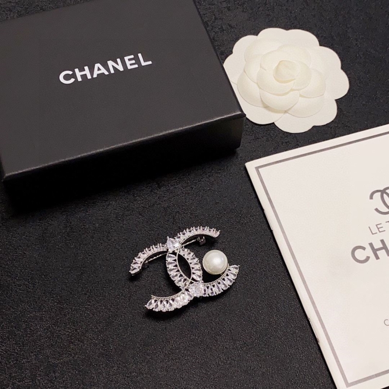 Ch**el brooches